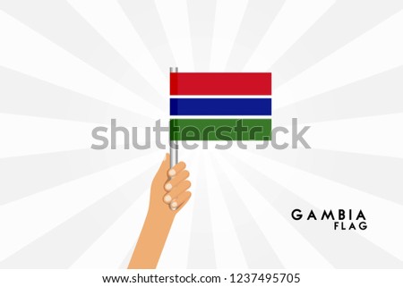 Vector cartoon illustration of human hands hold Gambia flag. Isolated object on white background.