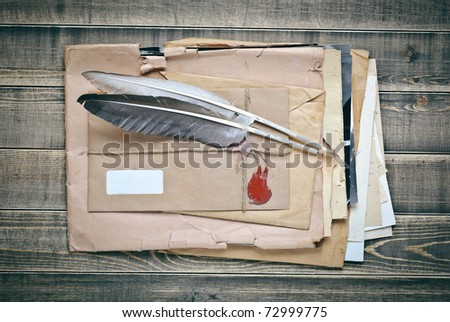 Vintage Envelopes with old papers and quill pens