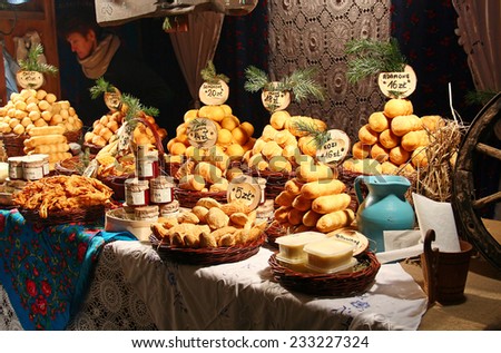 KRAKOW, POLAND - DECEMBER 26, 2011: Traditional polish smoked cheese oscypek on Christmas market