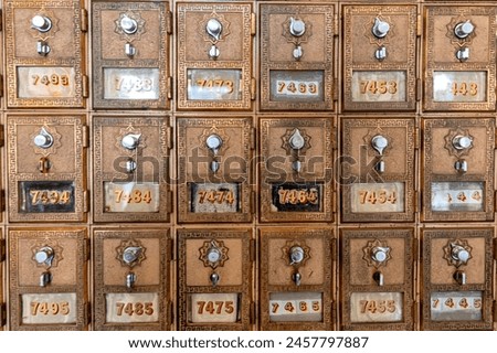 Image, Stock Photo old, pasted mailbox slot with a flap that says “LETTERS”, made of metal in an old wooden door, where the brown paint is peeling off / write letter / e-mail / mailbox company