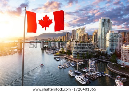 Canadian National Flag Overlay. False Creek, Downtown Vancouver, British Columbia, Canada. Beautiful Aerial View of a Modern City on the West Pacific Coast during a colorful Sunset.