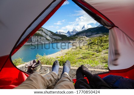 Camping inside a Tent in the Iconic Mt Assiniboine Provincial Park near Banff, Alberta, Canada. Canadian Mountain Landscape in Background. Concept: Adventure, Hiking, Backpacking, Freedom Photo stock © 
