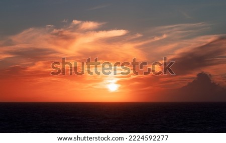 Similar – Image, Stock Photo Scenic sunset sky over rippling sea near hilly shores
