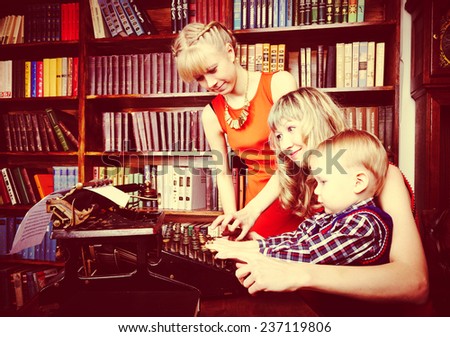 Happy family typing letter on old typewriter retro style