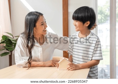 Image, Stock Photo Mom and her little daughter are walking, holding hands, spending time together