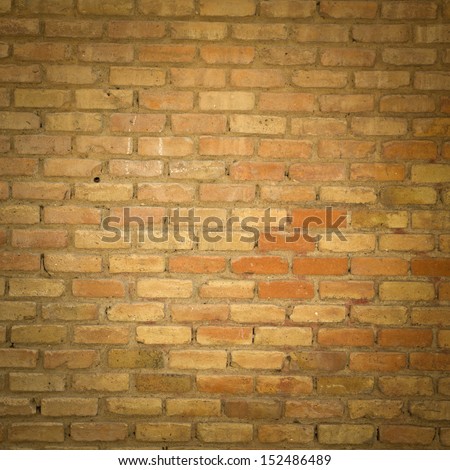 Background of brick wall texture. Red brick wall texture grunge background with vignetted corners.