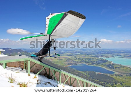 TEGELBERG, GERMANY - MAY 16: Competitor Oleg Matvieev from Ukraine of the King Ludwig Championship hang gliding competitions takes part on May 16, 2012 in Tegelberg, Germany