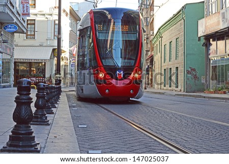 ISTANBUL - JULY 15 A modern tram on  on July 15, 2013 in Istanbul. Due to increasing traffic & air pollution, Istanbul became one of most polluted city also planned for return of tram.