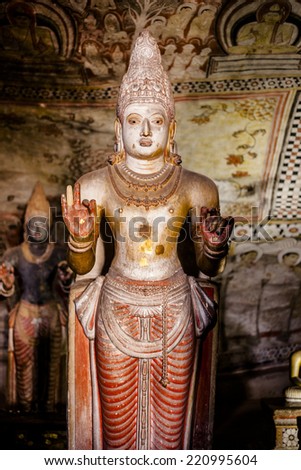 DAMBULLA, SRI LANKA - March 27, 2014: Cave temple. It has five caves under a vast overhanging rock and dates back to the first century BC. Dambulla Rock Temple is a Unesco World Heritage Site.