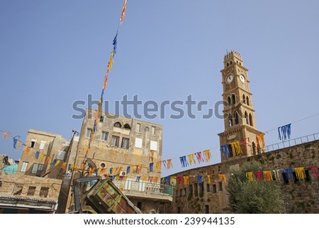 Old clock tower Akko , Ottoman landmark building - Han El-Umdan, Acre, Israel