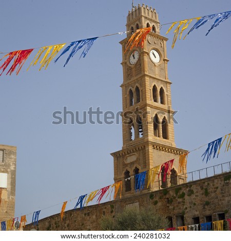 Old clock tower Akko , Ottoman landmark building - Han El-Umdan, Acre, Israel