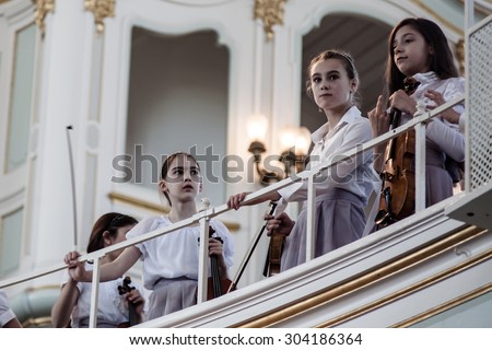 HAMBURG, GERMANY - MAY 29: Members of child Choir (EST) sing at the St. Michael Church -  - one of the well known landmarks of Hamburg, May 29, 2015 in Hamburg, Germany