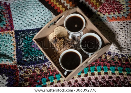 Coffee cups, with flowers in romantic atmosphere