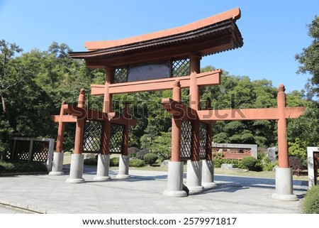 Similar – Image, Stock Photo large wooden gate with plain door handle, slanted wooden boards and painted with different green paint, which is peeling off