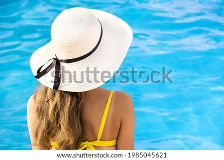 Similar – Image, Stock Photo Anonymous woman sunbathing on rocky beach