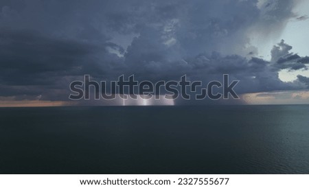 Similar – Foto Bild Sturmwolken über einem goldenen Kornfeld.