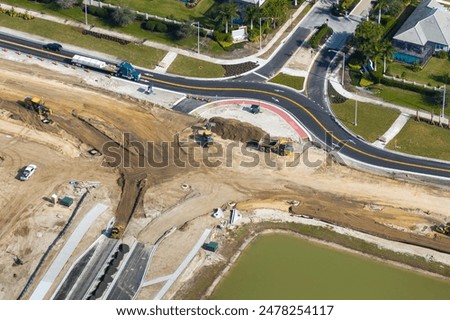 Similar – Image, Stock Photo Road infrastructure with roundabout in rural area