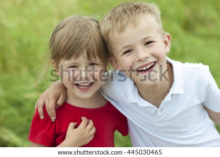 Young Boy And Girl Together Laughing Happily Stock Photo 445030465 ...