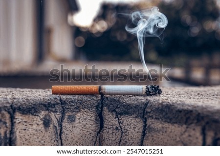 Similar – Image, Stock Photo Filter cigarette lies on a wooden table