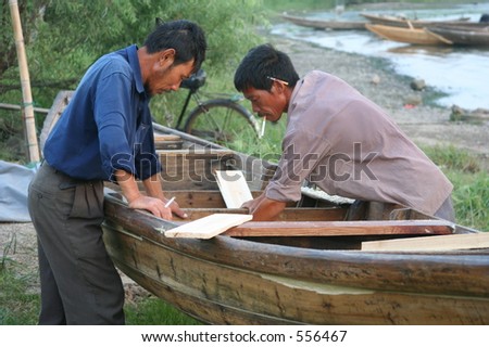 repairing boat