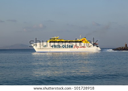PLAYA BLANCA, SPAIN - APRIL 2: the ferry Bocayna Express from Fred Olsen on the ocean at April 2,2012 in Playa Blanca, Spain. Fred Olsen connects Lanzarote with Fuerteventura since 1962 with his line.