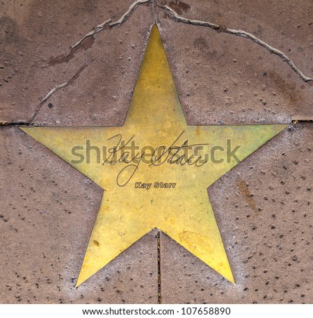PHOENIX, USA - JUNE 14: star of  Kay Starrin copper reflect the past glory of the Hotel San Carlos on June 14,2012 in Phoenix, USA.  The stars in the sidewalk were put in 1993 due to their visits.