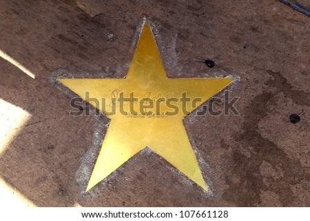 PHOENIX, USA - JUNE 14: star of  Clarc Gable in copper reflect the past glory of the Hotel San Carlos on June 14,2012 in Phoenix, USA. The stars in the sidewalk were put in due to their visits.