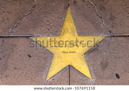 PHOENIX, USA - June 14: star of Gary Grant in copper reflect the past glory of the Hotel San Carlos on June 14,2012 in Phoenix, USA. The stars in the sidewalk were put in in 1993 due to their visits.