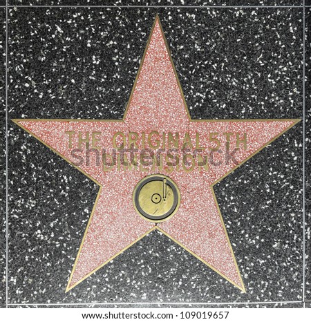 HOLLYWOOD - JUNE 26: The original 5th dimensions star on Hollywood Walk of Fame on June 26, 2012 in Hollywood, California. This star is located on Hollywood Blvd. and is one of 2400 celebrity stars.