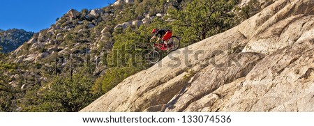 TUSCON, USA - OCT 9: downhill bike rider on Oct 9, 2011 in Tuscon, USA. There are around 1,000 bicycle related deaths in the United States each year, 75 percent of which are due to head injuries.