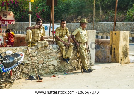 AMER, INDIA - OCT 19: police controls the parking lot on Oct 19, 2012 in Amer, India. Most indish landmarks are protected by police due to fear of terrorist attacs.