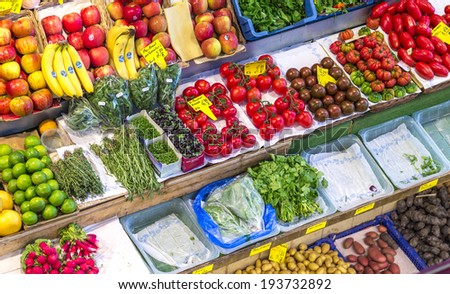 FRANKFURT, GERMANY - MAY 19, 2014: fresh vegetables offered in the Kleinmarkthalle  in Frankfurt, Germany. The hall from 1954 is the most famous fresh food market in Frankfurt on 1500 SQ (m2).