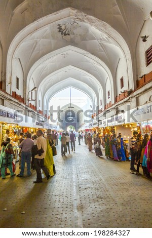 DELHI, INDIA - NOV 11: people shop inside the Bazaar in the Red Fort on November 11,2011 in Delhi, India. Meena Bazaar, built by Mukarmat Khan 300 years ago, was the first covered bazaar in India .