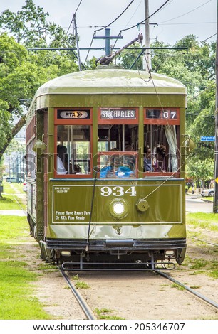 NEW ORLEANS - JULY 16, 2013: famous old Street car St. Charles line in New Orleans, USA. It is the oldest continually operating street car line in the world.