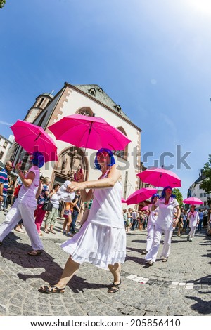 FRANKFURT, GERMANY - JULY 19, 2014: Christopher Street Day in Frankfurt, Germany. Crowd of people, gays, lesbian and bisexuals, participate in the parade celebrating the Christopher street day.
