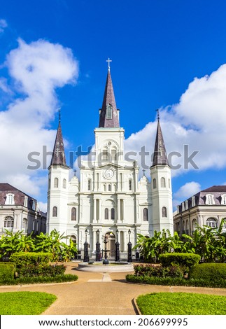 NEW ORLEANS, USA - JULY 17, 2013: Beautiful Saint Louis Cathedral in the French Quarter in New Orleans, USA. Tourism provides a large source of revenue after the 2005 devastation of Hurricane Katrina.