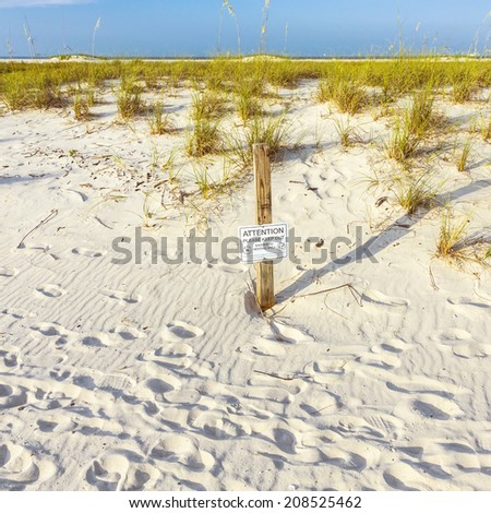 DAUPHINE ISLAND, AL USA - JULY 18, 2013: protected area for shorebird nesting at the beach in Dauphine Island, USA. An incredible 347 species have been reported on the island.