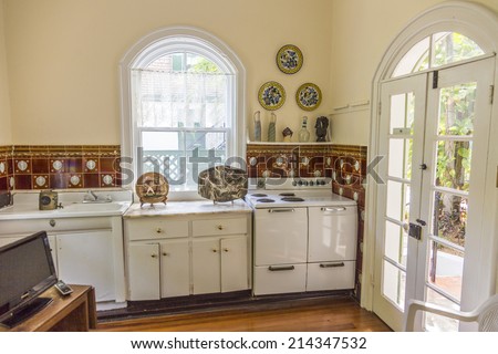 KEY WEST, USA - AUG 27, 2014: kitchen of Ernest Hemmingway house in Key West, USA. Ernest Hemingway lived and wrote here from 1931 to 1939.
