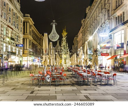 VIENNA, AUSTRIA - NOV 5, 2009: Vienna - famous Graben street at night with rain reflection on the cobbles in Vienna, Austria.