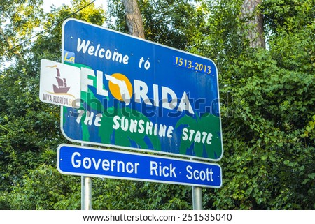 PENSACOLA, FLORIDA - JULY 18, 2013: Welcome sign to the state of Florida in Pensicola, USA. The area is ruled by Governor Rick Scott.