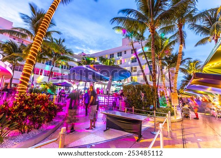 MIAMI, USA - AUG 3, 2013: Night life in the clevelander bar at Ocean drive in Miami, USA. Night-Life in South Beach is one of the main tourist attractions in Miami.