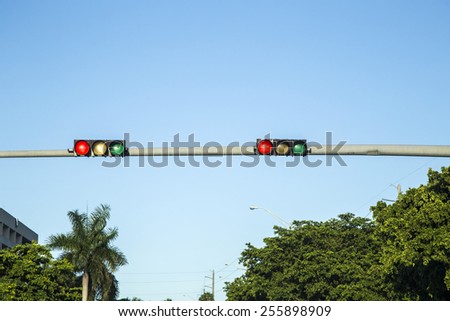 red traffic lights under blue sky