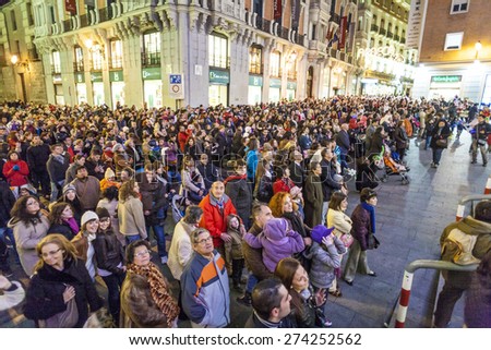 MADRID, SPAIN - DECEMBER 20: People have fun in Christmas time watching the famous puppet show and illumination at center El Corte Ingles on December 20, 2010 in Madrid, Spain.