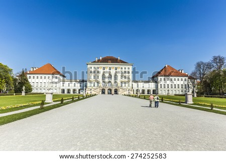 MUNICH, GERMANY -APR 20, 2015: people at Nymphenburg Palace, the summer residence of the Bavarian kings, in Munich, Germany. This palace welcomes 300,000 visitors per year.