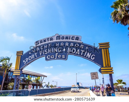 SANTA MONICA, USA - SEP 23, 2014: The welcoming arch of Santa Monica Pier in Santa Monica, USA. The site is an iconic 100-year-old landmark for California visitors.