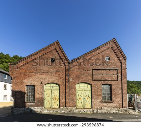 old industrial brick building in a small village in Hesse
