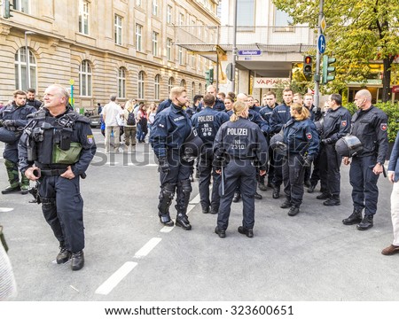 FRANKFURT, GERMANY - OCT 3, 2015: police guards one million people watching the celebration of 25th day of German unity in Frankfurt, Germany.