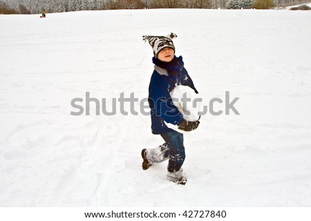 children are sledding down the hill in snow, white winter