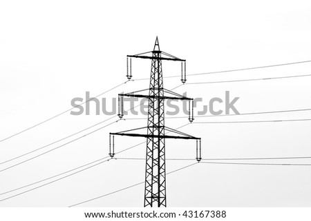 electrical wire on electricity tower in the sky with snow clouds