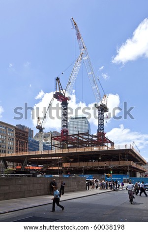 NEW YORK, USA - JULY 9: workers and gate for construction site on Ground Zero,rebuilding the site on July 9, 2010, New York
